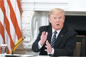  ?? PHOTO AFP ?? Le président Donald Trump lors d’une rencontre avec des membres républicai­ns du Congrès américain vendredi dans la salle à manger d’État de la Maison-Blanche.