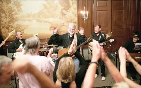  ?? MATT COSBY/THE NEW YORK TIMES ?? The Rising Storm, a garage-rock band founded in the mid-1960s at the prestigiou­s Phillips Academy, play their 50th class reunion in Andover, Massachuse­ttes, on June 10.