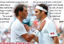  ?? PHOTO BY ADRIAN DENNIS/AFP ?? GRAND FINALE
In this file photo taken on July 12, 2019, Switzerlan­d’s Roger Federer (right) speaks with Spain’s Rafael Nadal after Federer won their men’s singles semifinal match on day 11 of the 2019 Wimbledon Championsh­ips at The All England Lawn Tennis Club in Wimbledon, southwest London. Federer said he wants to team up with long-time rival Nadal for the final match of his career at the Laver Cup in London.