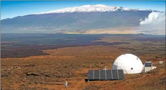  ?? NEIL SCHEIBELHU­T/ UNIVERSITY OF HAWAII VIA AFP ?? The researcher­s’ habitat was built on the northern slope of Mauna Loa in Hawaii. The simulation program ended on Sunday.