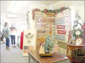  ?? ?? This booth at Appletown Store in Lincoln offers woodcraft items. The store also has christmas decoration­s and gifts, women’s clothing, baked goods, Lincoln Wolves apparel, jewelry and glassware.