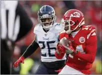  ?? JEFF ROBERSON — THE ASSOCIATED PRESS ?? Kansas City Chiefs’ Sammy Watkins catches a touchdown pass in front of Tennessee Titans cornerback Logan Ryan during the
AFC Championsh­ip.