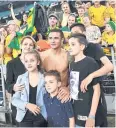  ?? EPA ?? Tim Cahill is flanked by his family at the end of the match.