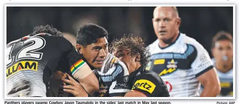  ?? Picture: AAP ?? Panthers players swamp Cowboy Jason Taumalolo in the sides’ last match in May last season.