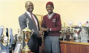  ??  ?? Makhubu and pupil Monde Rubushe. The school has received numerous educationa­l awards.