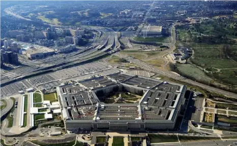  ?? Getty Images ?? This picture in December 2011 shows the Pentagon building in Washington. The Pentagon is the world’s largest office building by floor area, and has become a microcosm of how business, government agencies and people across the nation are trying to battle COVID-19.