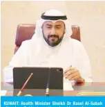  ??  ?? KUWAIT: Health Minister Sheikh Dr Basel Al-Sabah attends a Cabinet meeting via videoconfe­rence on Thursday.