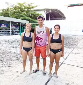  ?? CONTRIBUTE­D ?? BEST TEAM. Janelle Cabahug (left) and partner Ivie Bautista (right) along with coach Lemuel Arreza bucked the odds to win the PVF National Inter-Collegiate Women’s Beach Volleyball title. The team has only recently been formed and had not had any training prior to the tournament.