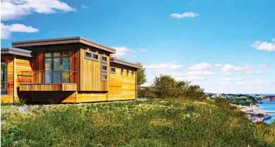  ??  ?? Beauty spot: Cedar-clad The Lookout at Aberconwy Resort & Spa sleeps six