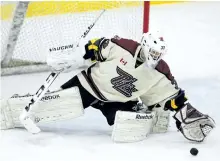  ?? CLIFFORD SKARSTEDT/EXAMINER FILES ?? Peterborou­gh major bantam AAA Petes goalie Creed Jones scoops up a puck against Vaughan Kings during the Boston Pizza Bantam Icefest Hockey tournament on Oct. 16, 2014 at the Evinrude Centre. Now a St. Peter Secondary School student who played major...