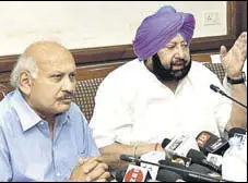  ?? HT PHOTO ?? Punjab chief minister Capt Amarinder Singh health minister Brahm Mohindra addressing the media in Chandigarh on Monday.