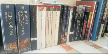  ??  ?? VALUABLE WORKS: The Herald reader Mircea Nigres’s picture, taken with a cellphone, of some of the volumes in his history book collection