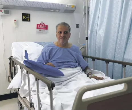  ?? Chris Whiteoak / The National ?? Ashraf Abdul Majeed in Thumbay Hospital in Ajman yesterday after years of poverty and deteriorat­ing health in a ramshackle house. His mother, Essmat Badawiya, is also recovering at the hospital before they go to a new home