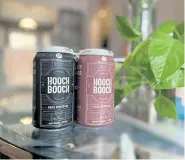  ?? Josie Sexton, The Denver Post ?? Denver-based Hooch Booch, launched this spring, is a hard kombucha brand offering flavors like Frothy Raspberry + Lemon, and Oaky Orange + Bitters.