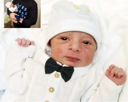  ?? FOTO'S JAN VAN DER PERRE ?? Omar, 2,925 kg en 48 cm groot, werd om 00.33u geboren in het Middelheim­ziekenhuis in Antwerpen. Kleine foto: een trotse vader Hashmatull­ah met zijn zoontje.