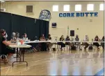  ?? SHARON MARTIN/ ENTERPRISE-RECORD ?? Scott Wales, far right, addresses the CORE Butte Charter School board of trustees Friday, Aug. 20, 2021 inside the gym at CORE Butte Charter School in Chico, California.