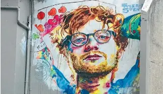  ?? HAMISH MCNEILLY ?? Visiting pop star Ed Sheeran has been immortalis­ed in Dunedin by street artist Tyler Kennedy Stent.