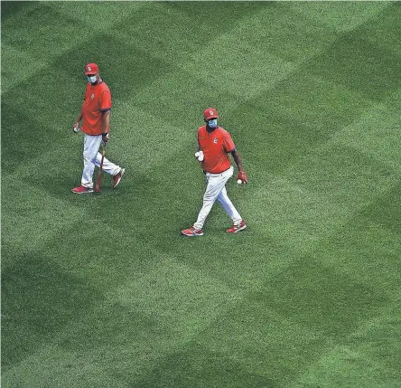  ?? JEFF CURRY/ USA TODAY SPORTS ?? The Cardinals, seen at a workout Saturday in St. Louis to prepare for the MLB’s season, is among six teams to cancel further practice because of delayed COVID- 19 testing results.