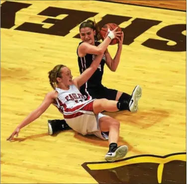  ?? AUSTIN HERTZOG — DIGITAL FIRST MEDIA ?? Boyertown’s Tori Boalton goes to the ground to grab a loose ball in front of Cumberland Valley’s Katie Jekot in the second half.