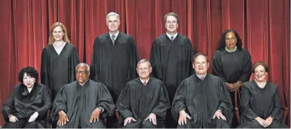  ?? ?? From left, Supreme Court Justices Sonia Sotomayor, Amy Coney Barrett, Clarence Thomas and Neil Gorsuch, Chief Justice John Roberts, and Justices Brett Kavanaugh, Samuel Alito, Ketanji Brown Jackson and Elena Kagan.