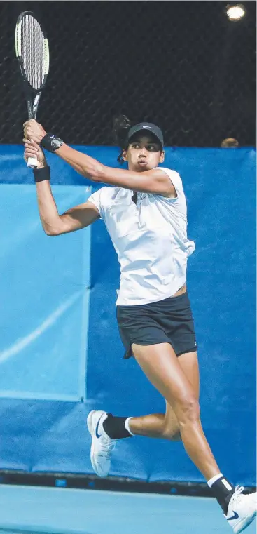  ?? Picture: JUSTIN BRIERTY ?? WELL TRAVELLED: Astra Sharma returns to Destanee Aiava in the women's final at the Cairns Tennis Internatio­nal, which actually finished up in Darwin.