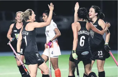  ?? Picture / www.photosport.nz ?? Stacey Michelsen (left) celebrates Deanna Ritchie’s goal last night.