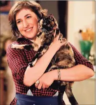  ?? Lisa Rose / FOX ?? “The Big Bang Theory’s” Mayim Bialik stars as Kat, a quirky almost-40 single woman who quits her job as a math professor to open a cat café in Louisville, Ky. It debuted Jan. 3.