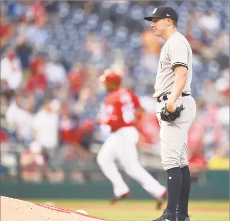  ?? Mitchell Layton / Getty Images ?? The Yankees’ Chad Green looks on after giving up a two-run home run in the sixth inning to Juan Soto during game one of a doublehead­er at Nationals Park in Washington on Monday.