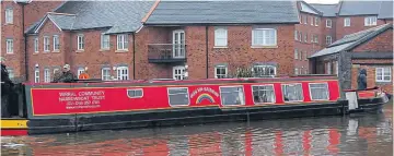  ?? PHOTO: JANET RICHARDSON ?? The Wirral Community Narrowboat Trust’s narrowboat Over the Rainbow, providing boat trips during an Easter gathering at the National Waterways Museum, Ellesmere Port.