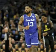  ?? AARON GASH- THE ASSOCIATED PRESS ?? Seton Hall’s Myles Powell runs back after hitting a shot during the first half of an NCAA college basketball game against Marquette Saturday, Feb. 29, 2020, in Milwaukee.