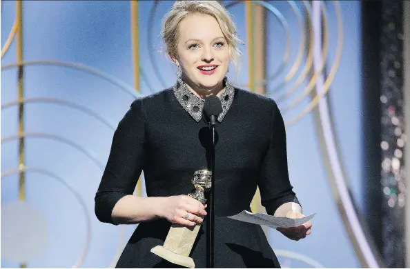  ?? PAUL DRINKWATER/NBC ?? Actress Elisabeth Moss paid homage to Margaret Atwood while accepting the Golden Globe for her role in The Handmaid’s Tale, based on the Canadian author’s novel .