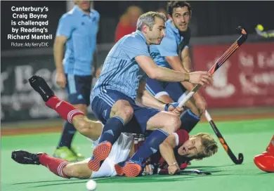  ?? Picture: Ady Kerry/chc ?? Canterbury’s Craig Boyne is challenged by Reading’s Richard Mantell