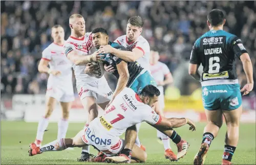  ?? PICTURE: ISABEL PEARCE/SWPIX.COM ?? BACK IN THE GAME: Leeds Rhinos captain Kallum Watkins finds his path blocked in the hard-fought defeat at Super League rivals St Helens last week.