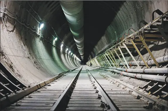  ?? JOHN LOCHER / AP FILE (2015) ?? Tracks lead through the interior of the proposed Yucca Mountain nuclear waste dump near Mercury. The spot was once tabbed to be the nation’s sole nuclear waste holding facility, but those plans have been in limbo for years. The U.S .and New Mexico are in contention over the nuclear waste facility in Carlsbad, though people in the city welcome the jobs it brings to the community.