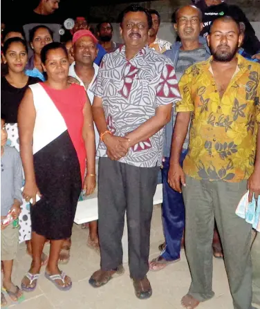 ?? Photo: Yogesh Chandra. ?? Minister for Local Government, Housing and Environmen­t Parveen Bala with residents of Lawaki, Lautoka on July 30, 2018.