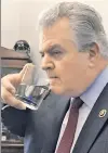  ??  ?? TAKE AND DRINK:
Faithful Rep. Bob Brady swiped the half-full glass of water from which Pope Francis drank while addressing Congress, and then took a sip himself before sharing some later with wife Debra.