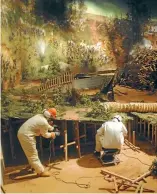  ?? ARTSATL.COM ?? Workers prepare the Atlanta Cyclorama, which measures 1400 square metres and weighs six tonnes, to be cut in half and moved.