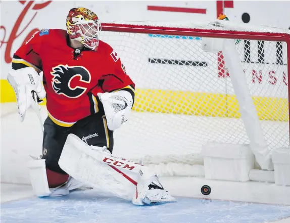  ?? — THE CANADIAN PRESS FILES ?? Calgary Flames goaltender Brian Elliott was supposed to be the No. 1 guy in the crease this season for his team. Instead, he hasn’t played since Nov. 28 against the New York Islanders, ceding the starting role to teammate Chad Johnson.