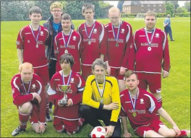  ??  ?? Canterbury City disability team with their runners-up trophy