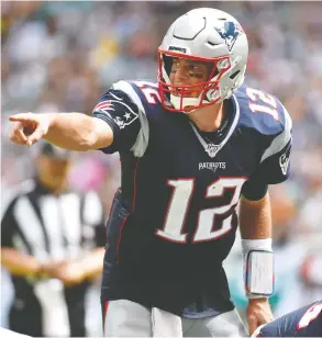  ?? ERIC ESPADA / GETTY IMAGES FILES ?? An upcoming docu-series on Tom Brady may be a bit too early, especially for non-New
England football fans sick of the Patriots’ recent dominance, Des Bieler writes.