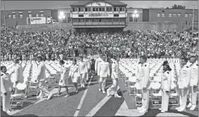  ?? ?? The members of the Class of 2022 arrive on Cadet Memorial Field for the ceremony.