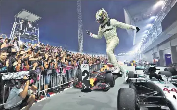  ?? AP ?? Mercedes driver Lewis Hamilton completed a hattrick of victories by winning the Singapore Grand Prix on Sunday.