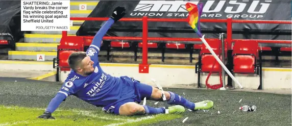  ?? POOL/GETTY IMAGES ?? SHATTERING: Jamie Vardy breaks the corner flag while celebratin­g his winning goal against Sheffield United