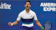  ?? (AP/John Minchillo) ?? Novak Djokovic reacts after scoring a point against Kei Nishikori during the third round of the U.S. Open on Saturday in New York. Djokovic advanced to the fourth round with a 6-7 (4), 6-3, 6-3, 6-2 victory.