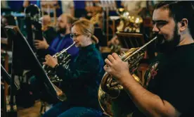  ?? ?? The National Symphony Orchestra of Ukraine rehearsing in the Kyiv Philharmon­ic Hall. Photograph: Julia Kochetova/The Guardian