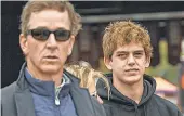  ?? KEN RUINARD/ USA TODAY SPORTS ?? Arch Manning, shown with his father, Cooper Manning, is the top- rated player in the Class of 2023.