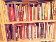  ??  ?? Just of couple of the shelves with baking and dessert cookbooks.