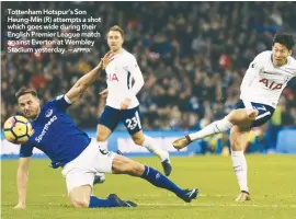  ?? THE INDEPENDEN­T ?? Tottenham Hotspur’s Son Heung-Min (R) attempts a shot which goes wide during their English Premier League match against Everton at Wembley Stadium yesterday. – Eibar 0 Atletico Madrid Real Madrid 0 Girona 1 Villarreal 1 6 Mainz 2 Stuttgart 1 Hertha...