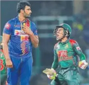  ?? AP ?? Bangladesh’s Mushfiqur Rahim (right) celebrates after hitting the winning run against Sri Lanka in Colombo on Saturday.