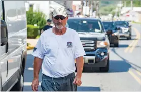  ?? Ben haStY — reaDing eagle ?? frank Stiller, the chairman and ceo of tunnel to towers, walks through hamburg on thursday morning, aug. 27, as part of the never forget Walk. the organizati­on works to preserve the memory of the terrorist attacks of 9/11. the walk will go through Pennsylvan­ia and end at ground Zero in new York.